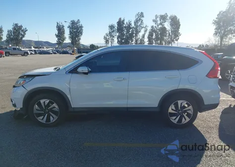 2016 Honda Cr-V Touring z USA, uszkodzony, nr VIN 5J6RM3H91GL016095